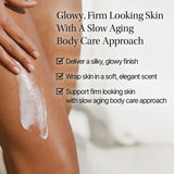 Person applying a skincare product to their leg with text about slow aging body care approach.Close-up shot of the creamy white lotion texture being applied to skin, highlighting its smooth and non-sticky finish.